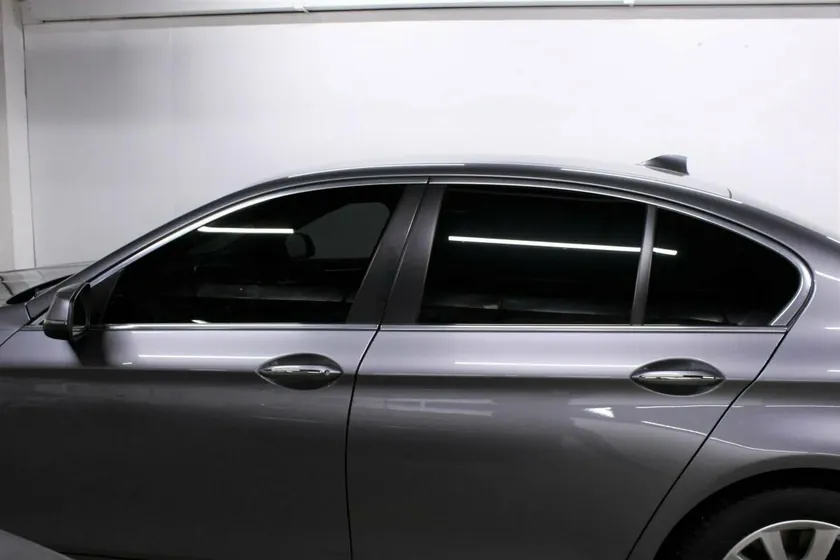 Automotive window tinting